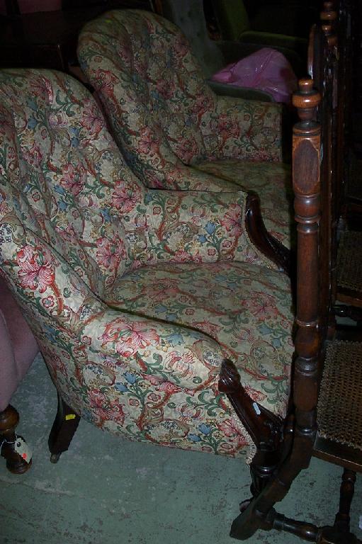 Appraisal: A pair of Victorian spoon back drawing room chairs with