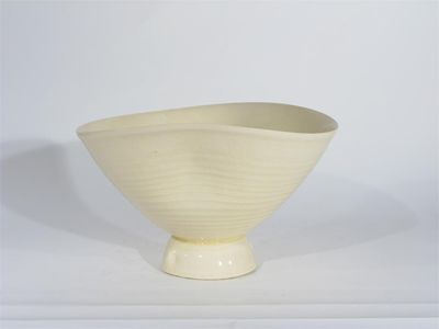 Appraisal: A Takeshi Yasuda Distorted Creamware footed bowl covered in a