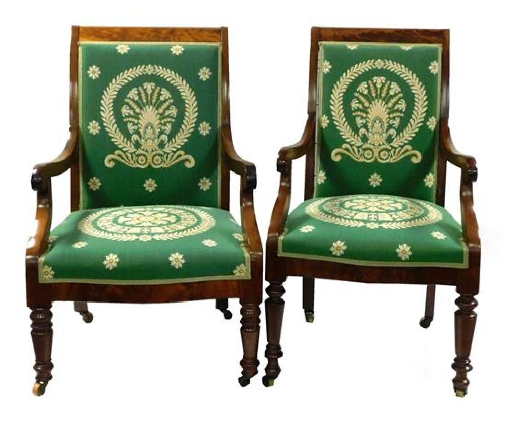 Appraisal: Two American Empire mahogany open armchairs c upholstered in green