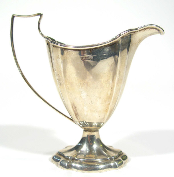 Appraisal: Silver cream jug the body of fluted form Birmingham cm