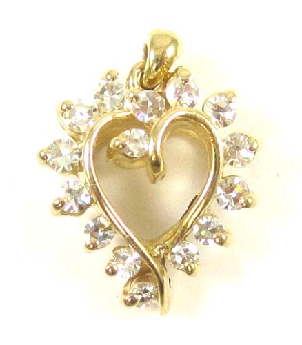 Appraisal: DIAMOND AND FOURTEEN KARAT GOLD PENDANT The open heart pendant