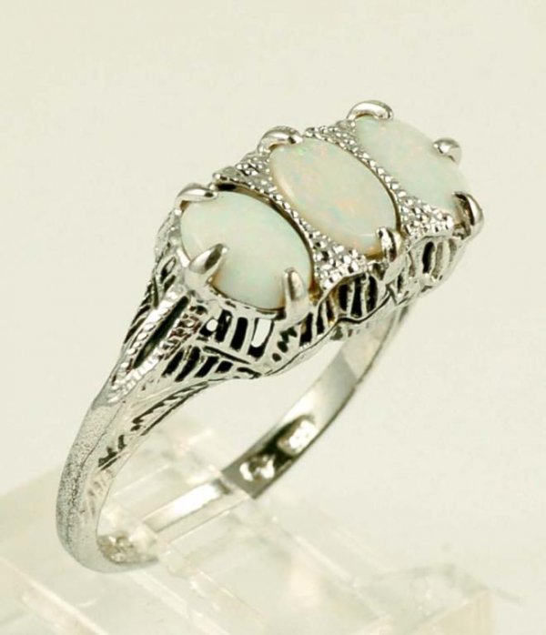 Appraisal: Filigree ring in marked sterling silver with rhodium plate Set