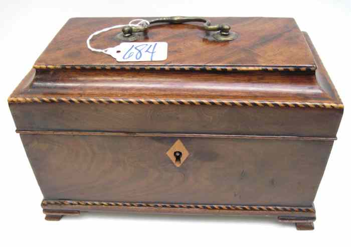 Appraisal: ENGLISH VICTORIAN MAHOGANY TEA CADDY the hinged top lifts to