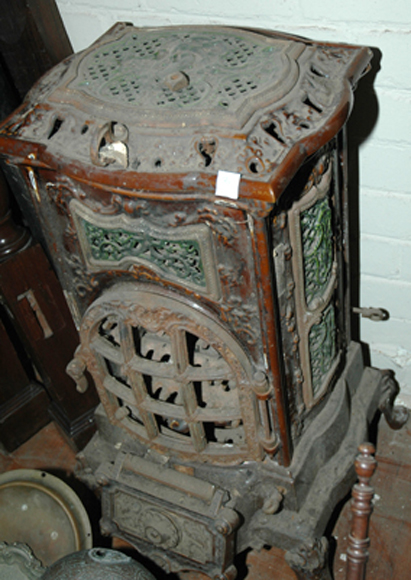 Appraisal: A TH CENTURY FRENCH CAST IRON AND ENAMEL STOVE