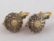 Appraisal: A pair of French hallmarked carat gold seed pearl and