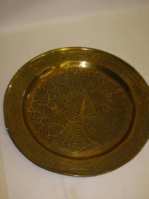 Appraisal: A LARGE MIDDLE EASTERN BRASS PLAQUE of dished circular form