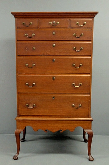 Appraisal: Pennsylvania Queen Anne walnut chest-on-frame with a molded cornice and