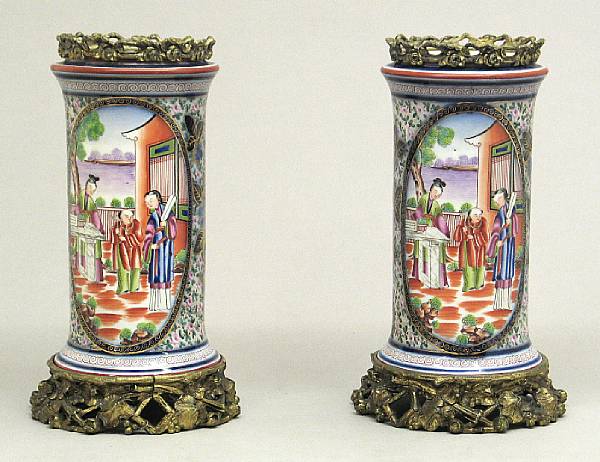 Appraisal: A pair of French porcelain gilt bronze mounted porcelain oil