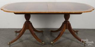 Appraisal: Baker Federal style mahogany dining table with three '' leaves