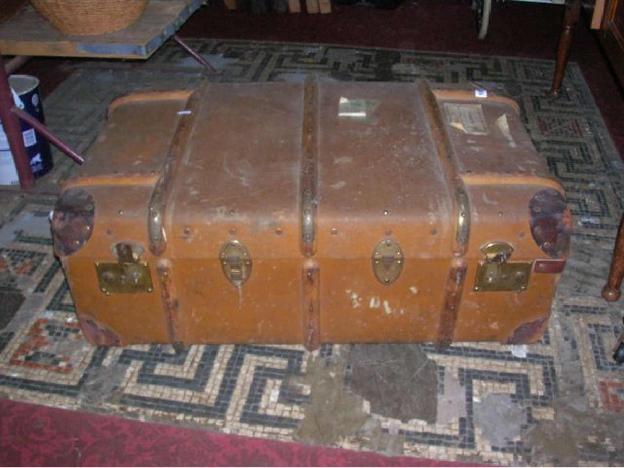 Appraisal: A vintage fibre leather re-inforced and timber lathe bound cabin