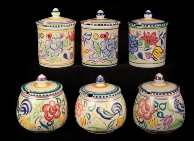 Appraisal: Poole Pottery three floral jam pots and covers cm high