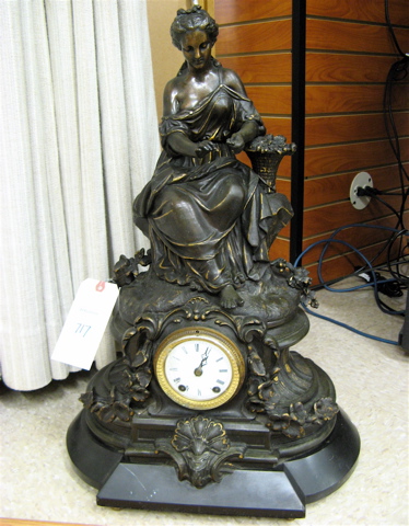 Appraisal: BRONZED SPELTER AND BLACK MARBLE STATUE CLOCK French late th