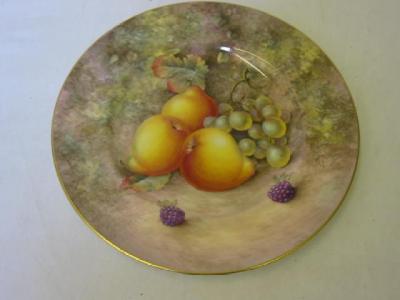 Appraisal: A ROYAL WORCESTER PORCELAIN PLATE painted with pears and grapes