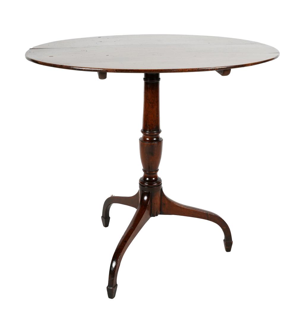 Appraisal: ANTIQUE GEORGIAN-STYLE OAK TRIPOD TABLEwith oval-shaped tilt top Provenance the