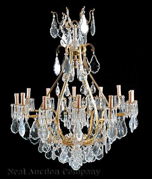 Appraisal: A Pair of Louis XVI-Style Gilt Bronze and Crystal Twelve-Light