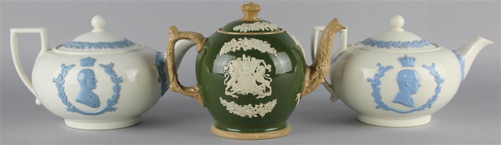 Appraisal: THREE ENGLISH COMMEMORATIVE TEAPOTS AND COVERS including one green ground