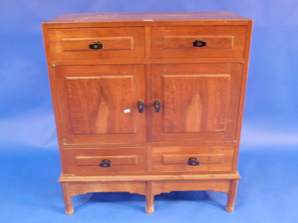 Appraisal: A Gordon Russell of Broadway Walnut side cabinet with an