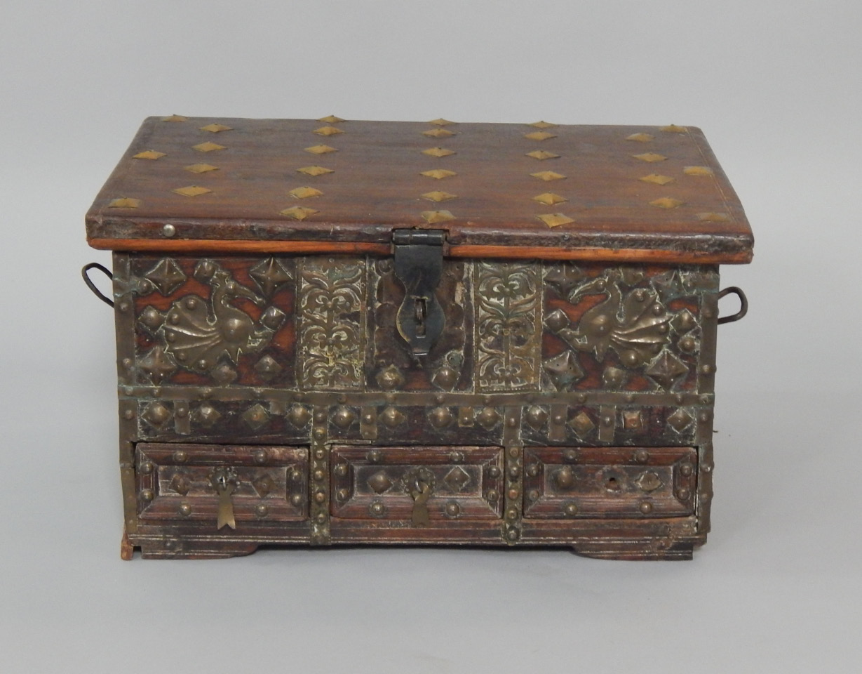 Appraisal: An Indian hardwood box with brass studded and overlaid decoration