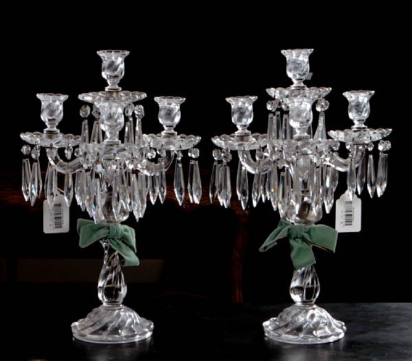 Appraisal: A pair of Baccarat style glass four light candelabra chip