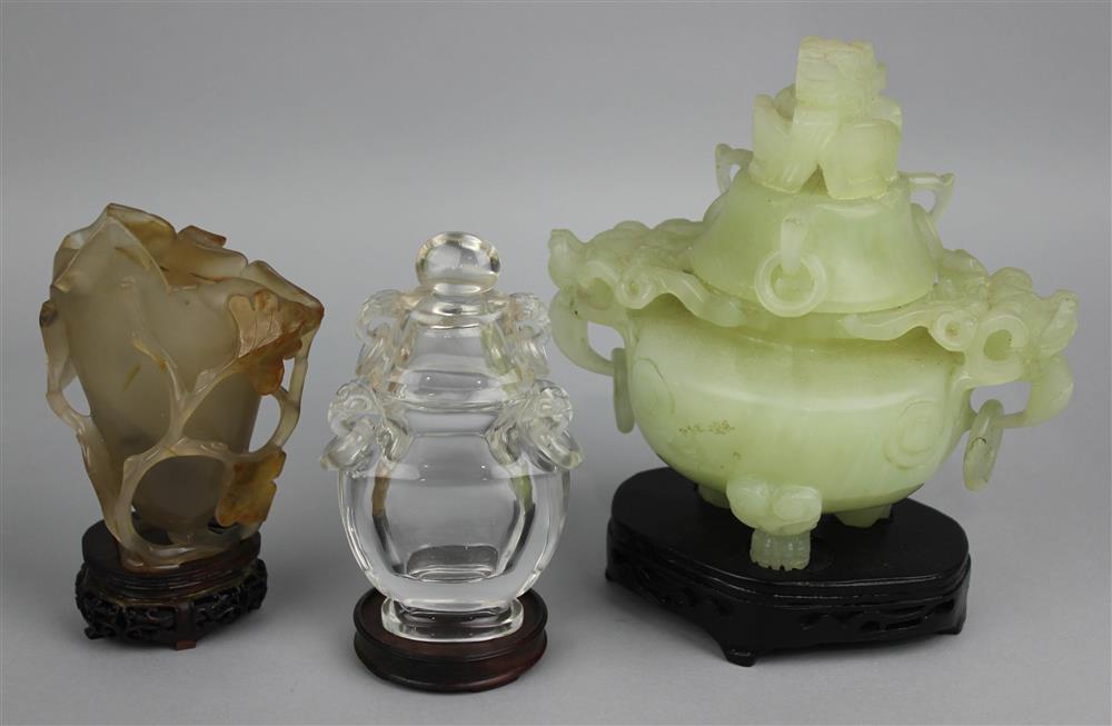 Appraisal: THREE CHINESE CARVED HARDSTONE VESSELS including a carnelian agate magnolia