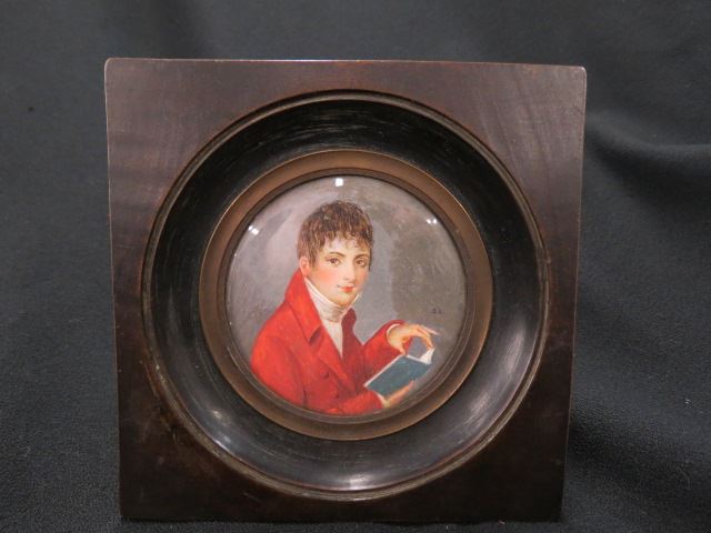 Appraisal: Miniature Painting on Ivory of Young Man Reading red coat