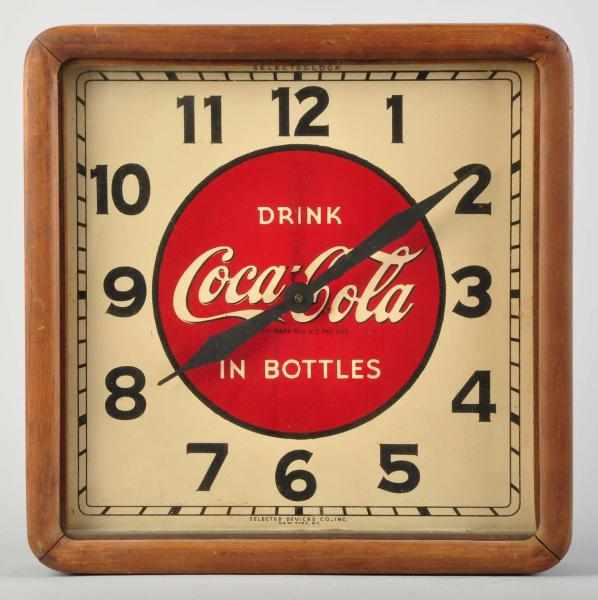 Appraisal: Wooden Tin Coca-Cola Selectoclock Description Circa Runs fine Motor is