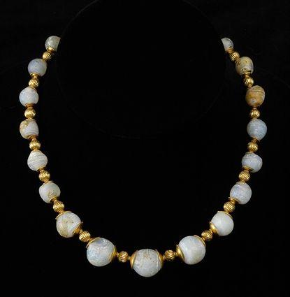 Appraisal: Glass and Gold Bead Necklace