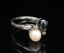 Appraisal: A Ladies' Ring Set With Pearls And Diamonds A ladies'