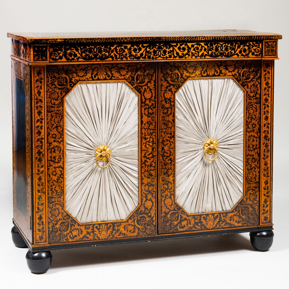 Appraisal: Regency Penwork and Ebonized Side Cabinet The overhanging top over