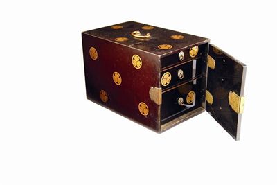 Appraisal: A Japanese lacquer chest with gilt decoration gilt brass carrying