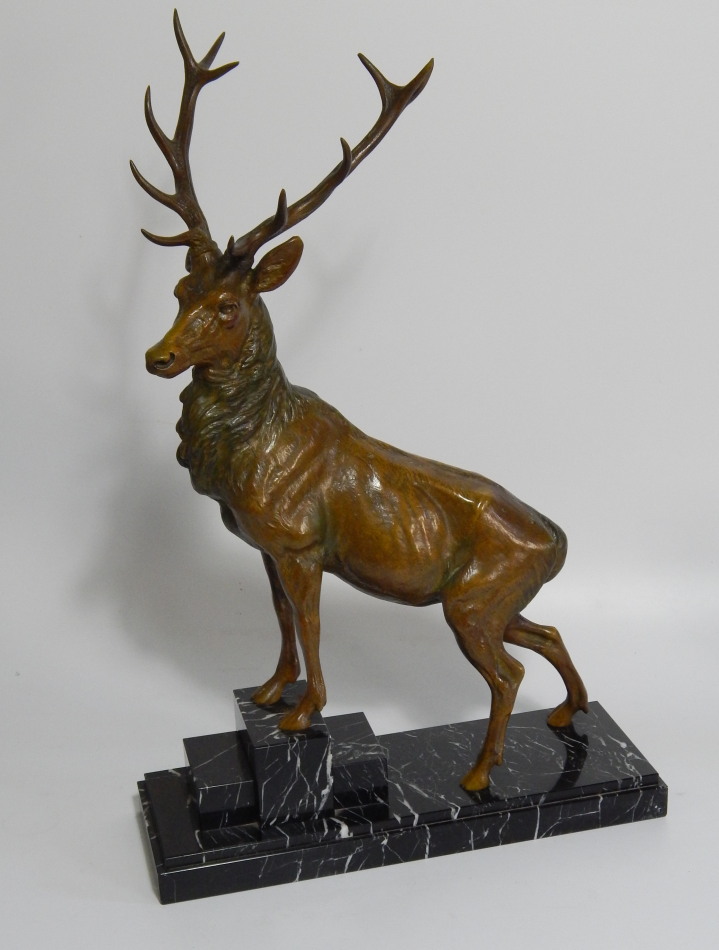 Appraisal: A 's bronze model of a stag with green and