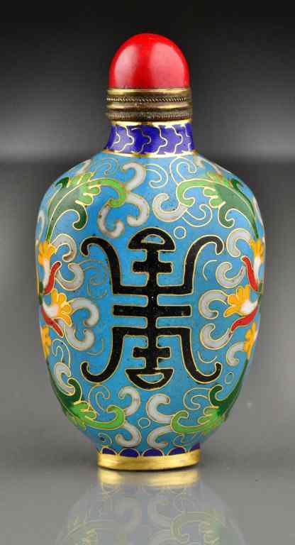 Appraisal: Chinese Cloissone Snuff BottleDepicting lotus blossoms and scrolling tendrils around