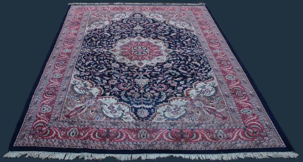 Appraisal: LARGE HERIZ WOOL RUG central medallion colors include navy rose