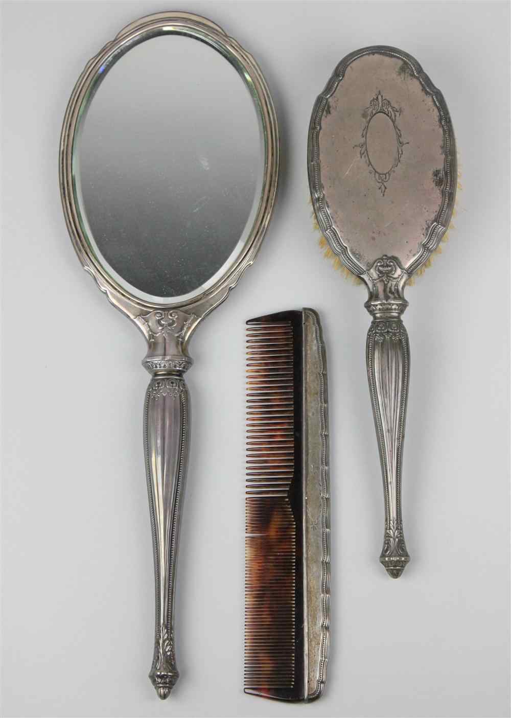 Appraisal: WEBSTER STERLING MIRROR BRUSH AND COMB marked with W and