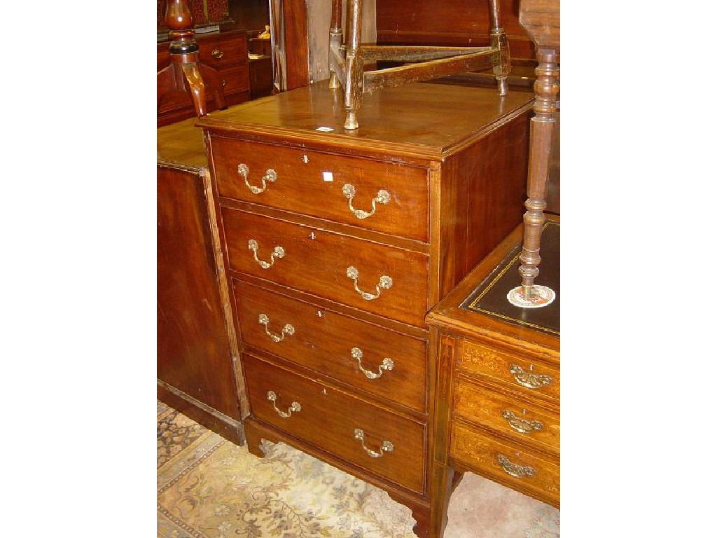 Appraisal: A Georgian mahogany upright chest fitted with an arrangement of