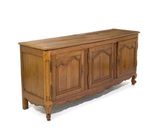 Appraisal: A FRENCH PROVINCIAL WALNUT SIDEBOARD A FRENCH PROVINCIAL WALNUT SIDEBOARD