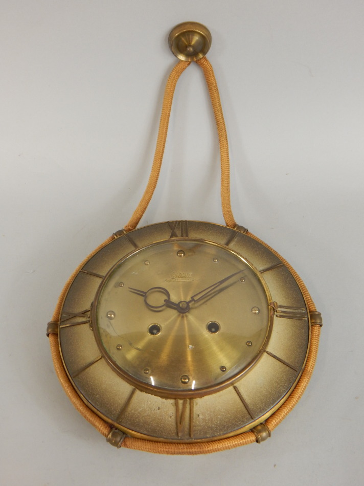 Appraisal: A retro style 's German wall clock the brass dial