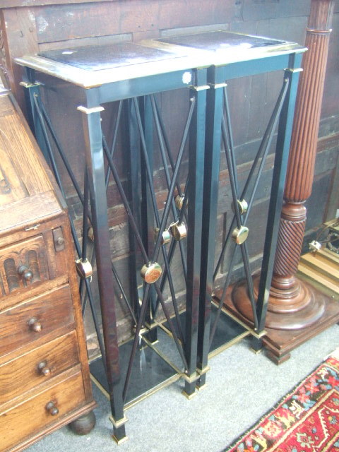 Appraisal: A pair of black painted and parcel gilt metal stands