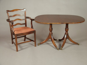 Appraisal: A mahogany twin pedestal dining table th century the rounded