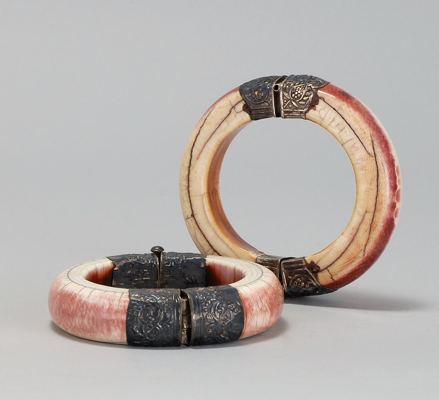 Appraisal: PAIR OF ELEPHANT IVORY BRACELETS Late th Early th CenturyWith