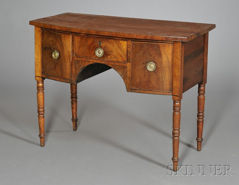 Appraisal: Regency Mahogany Diminutive Bowfronted Sideboard early th century the case