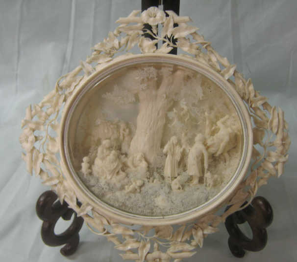 Appraisal: CONTINENTAL FINELY CARVED IVORY NATURALISTIC SCENE Three dimensional depicting resting