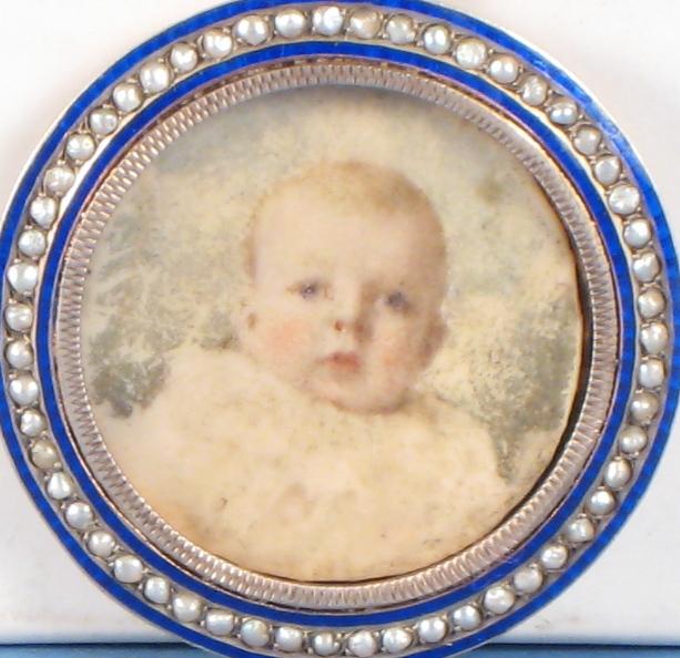 Appraisal: ENGLISH SCHOOL CIRCA Portrait miniature of a Baby head and