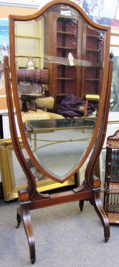 Appraisal: A late th century inlaid mahogany shield shaped cheval mirror