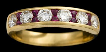 Appraisal: karat yellow gold ruby and diamond band ring Tiffany Co