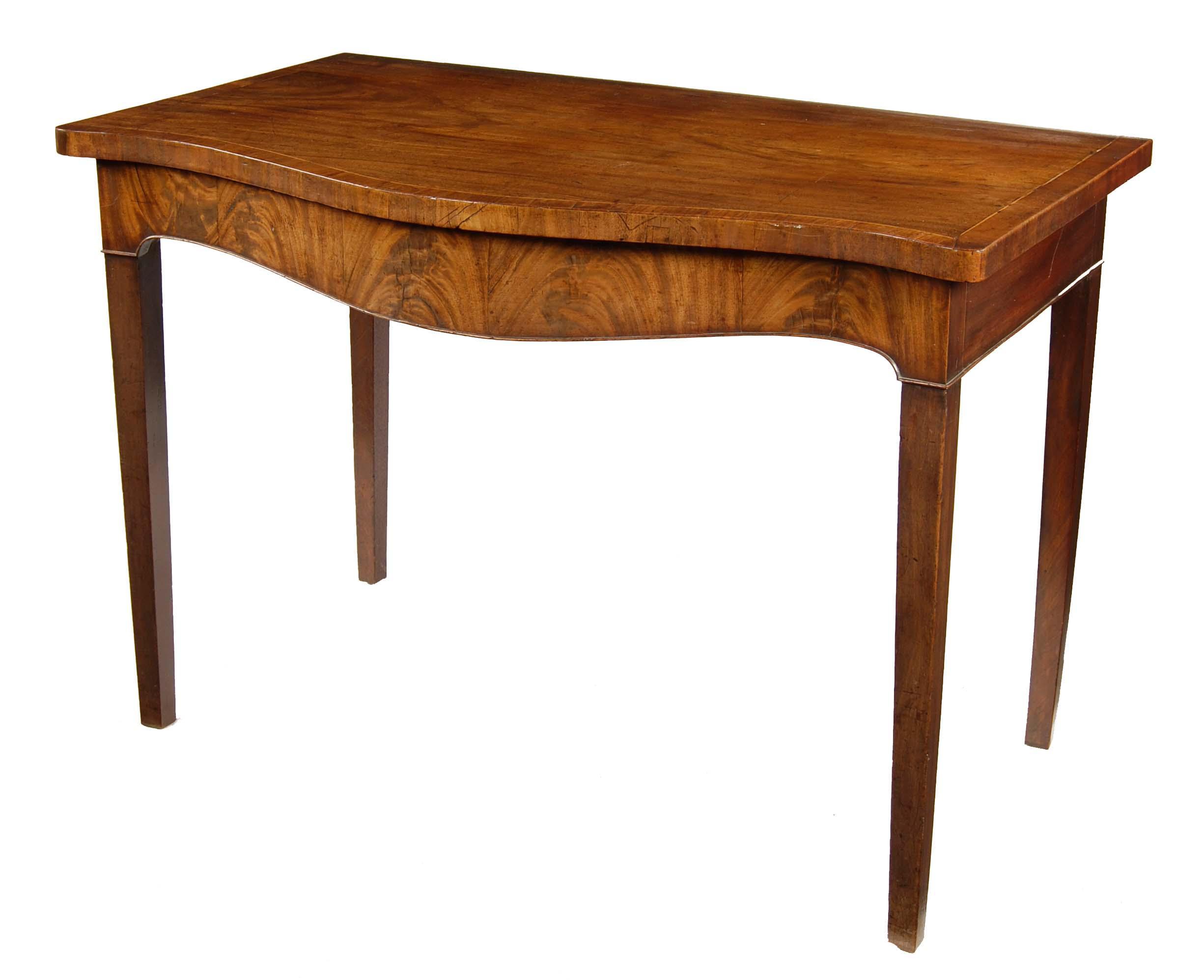 Appraisal: A George III mahogany serpentine serving table