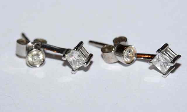 Appraisal: A PAIR OF DIAMOND SET EAR STUDS with diamond set