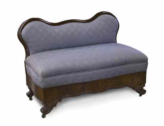 Appraisal: An American Empire Mahogany Window Bench having a serpentine crest