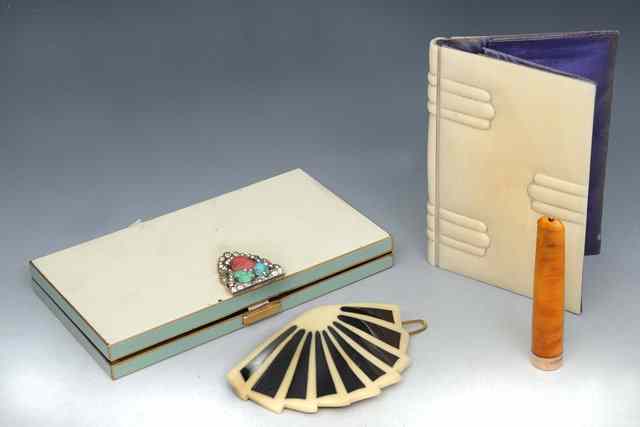 Appraisal: An Art Deco ivory visiting card case x an amber