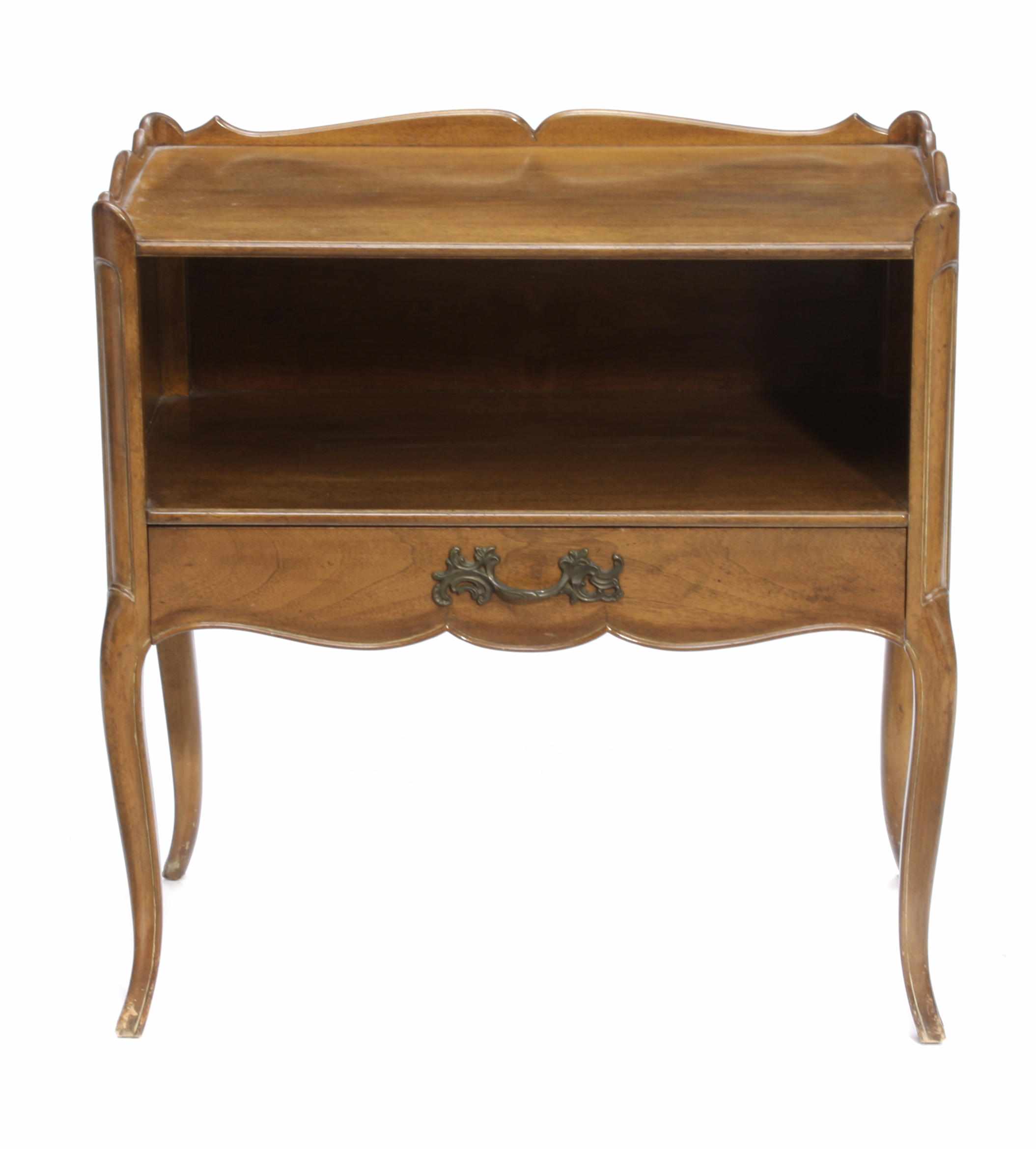 Appraisal: A Louis XV style mixed wood bedside table height in